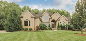 Exterior painting in Aurora, Ohio for large homes needing coordinated siding, trim, and detail work