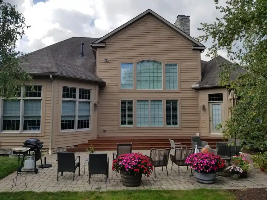 Exterior house painters in Aurora, Ohio for backyard siding and trim painting with clean coverage