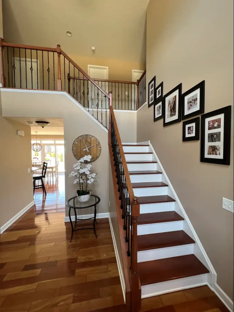 Interior staircase and entryway showing interior painting in Avon Lake, Ohio with walls and trim