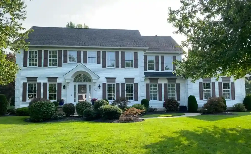 Two story home exterior suited for a house painter in Avon, Ohio for siding and trim refresh