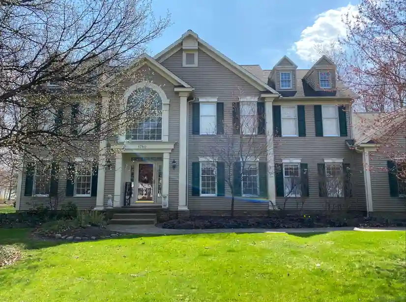 Avon, Ohio exterior home ready for painting contractors to update siding, trim, and curb appeal