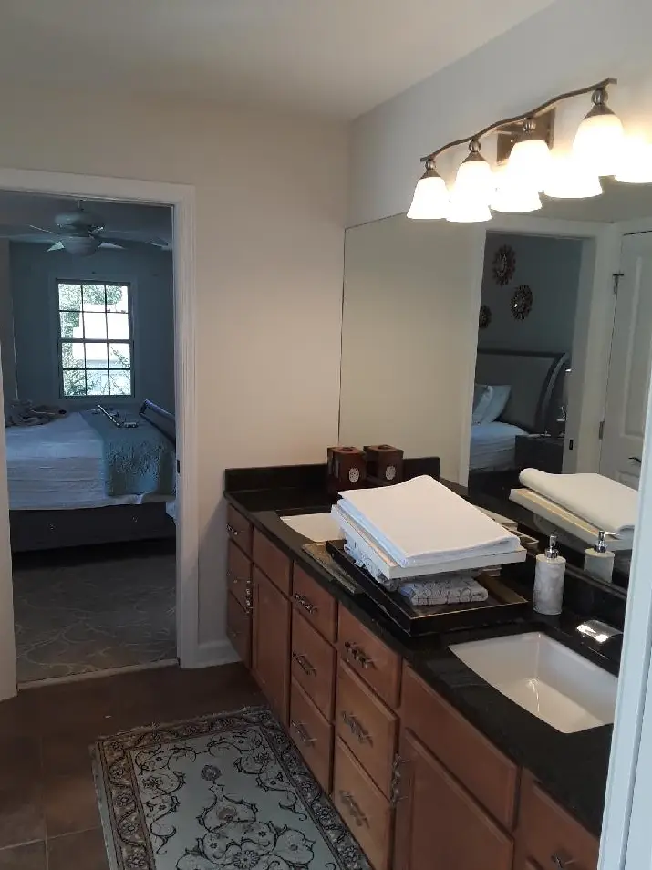 Bathroom painting in North Olmsted, OH by Chagrin Falls Painting Company, smooth wall finish and clean trim detail for a fresh updated look