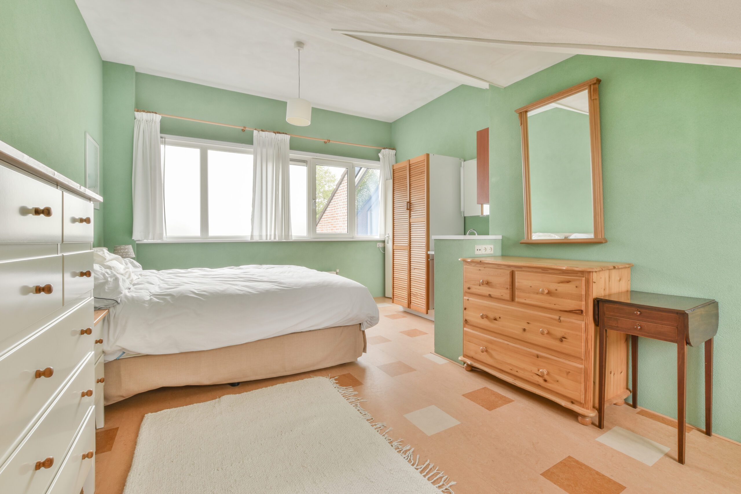 A serene bedroom in Richfield, Ohio, with fresh, calming paint colors