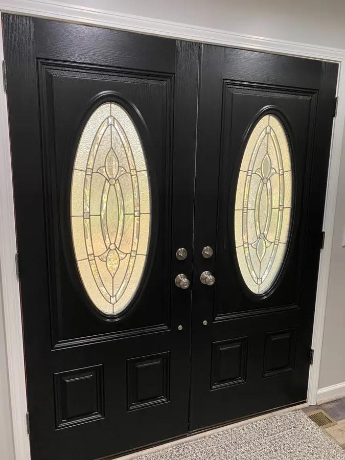 Black double front door painting by Chagrin Falls Painting Company, Ohio