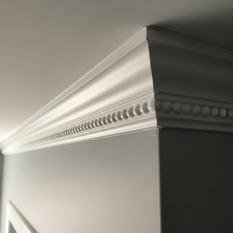 close-up of painted crown molding and wall trim detail in Ohio home