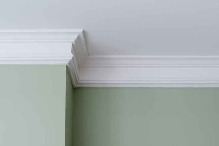 Cutting, installing, and placing crown molding in a step-by-step guide