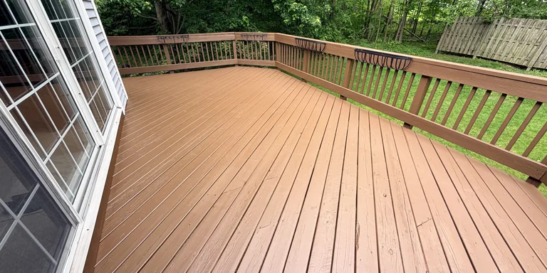 Freshly stained wood deck and railing in Aurora, Ohio