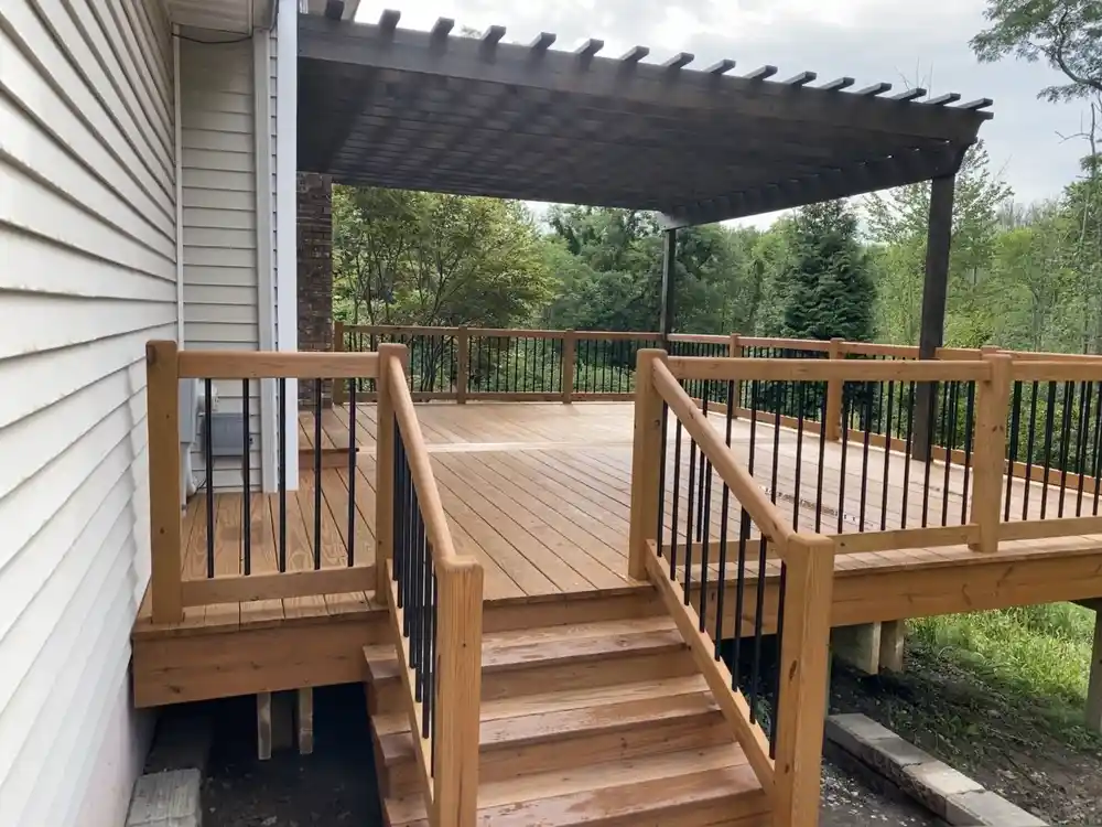 Deck staining in North Olmsted, OH by Chagrin Falls Painting Company, stained deck boards with consistent color and protected wood grain