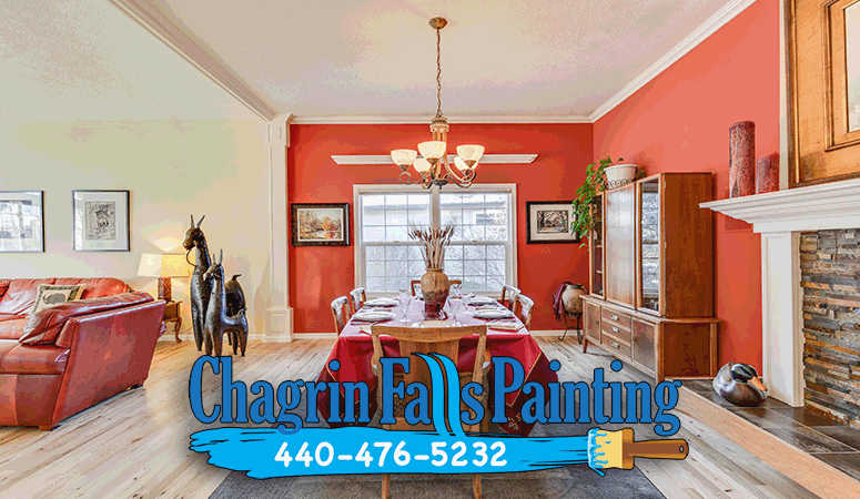 A dining room in Avon Lake, Ohio, featuring a bold accent wall painted by professionals.