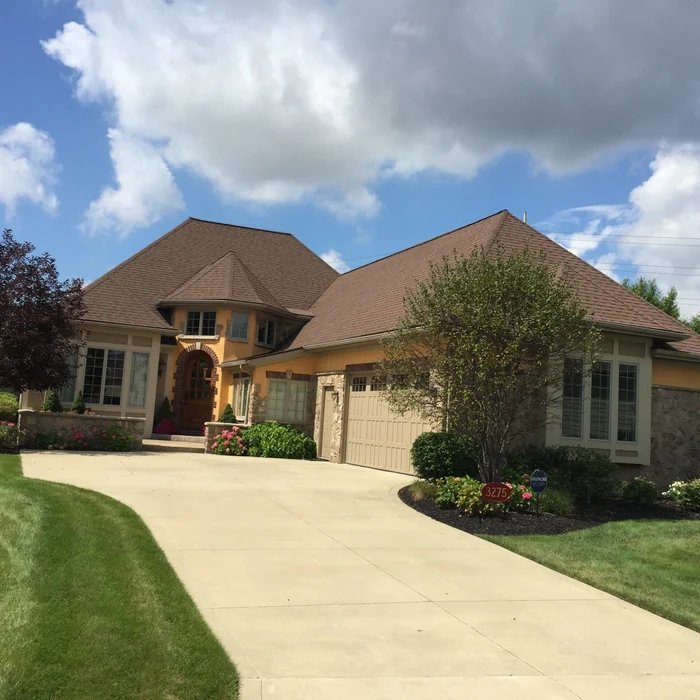 Clean concrete driveway after professional driveway power washing in Hudson, Ohio
