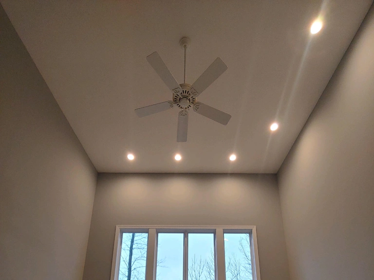 Prepped bedroom ceiling with a fan and recessed lights ready for paint, Aurora, Ohio