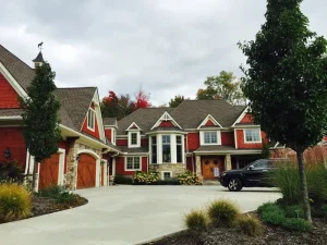 Red cedar shake exterior house painting by Chagrin Falls Painting Company, Ohio