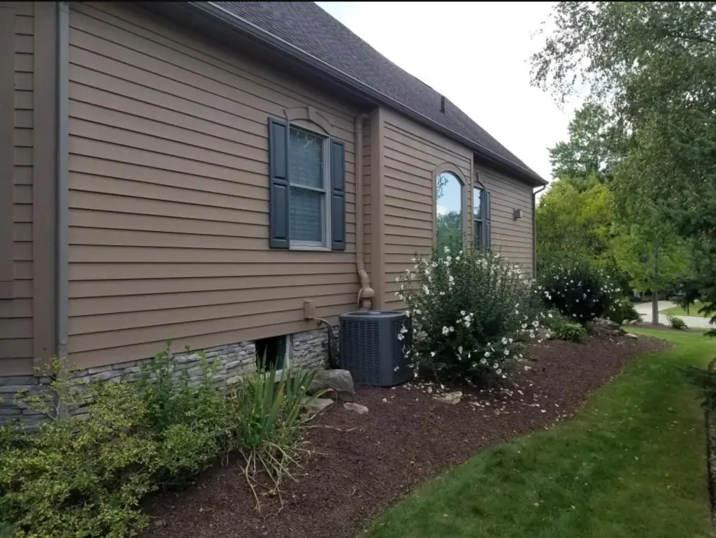 exterior siding painting along side of home