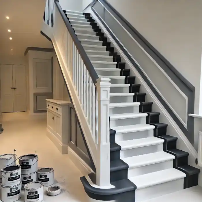 A professionally painted staircase with a modern two-tone design.