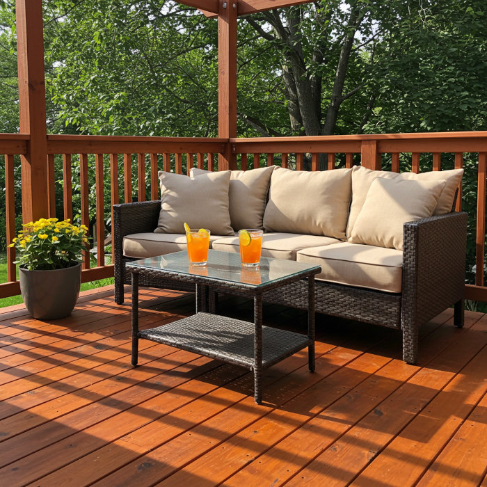 Stained backyard deck in late summer sun with comfortable seating and UV-resistant finish