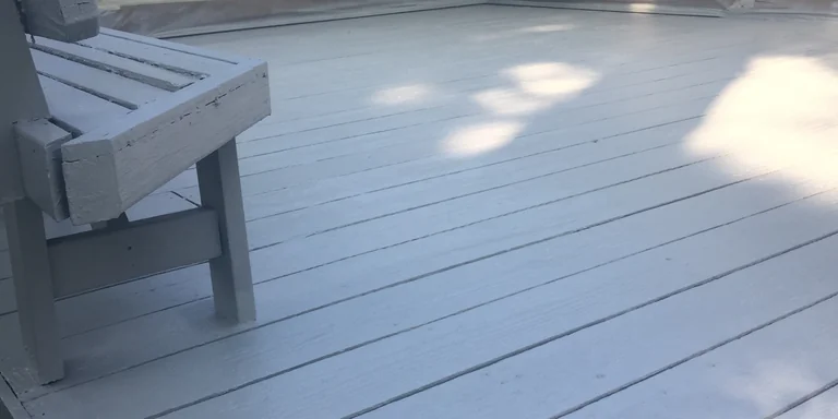 Wood deck and bench painted light gray in Hudson, Ohio