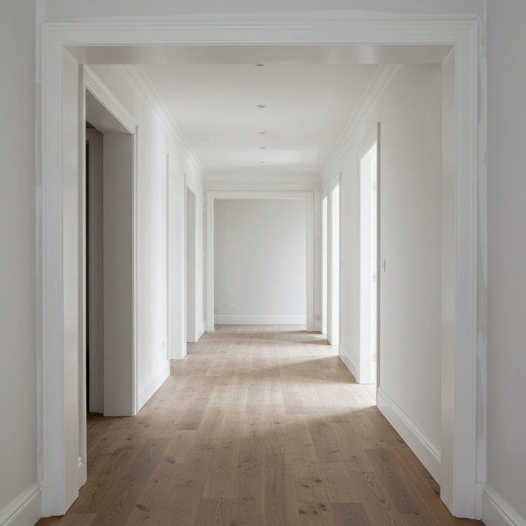 Hallway cleared and walls cleaned for professional painting project
