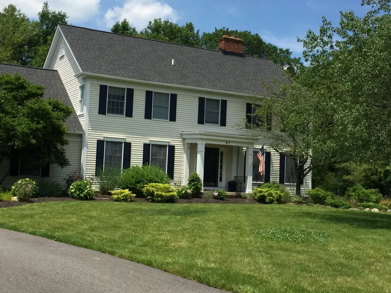 Vinyl-sided colonial home after a house wash, house power washing in Hudson, Ohio
