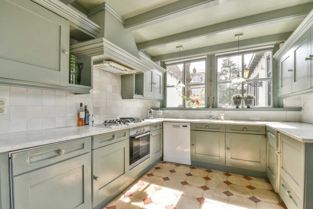 Professionally painted kitchen with modern cabinet refinishing in Hinckley, Ohio.