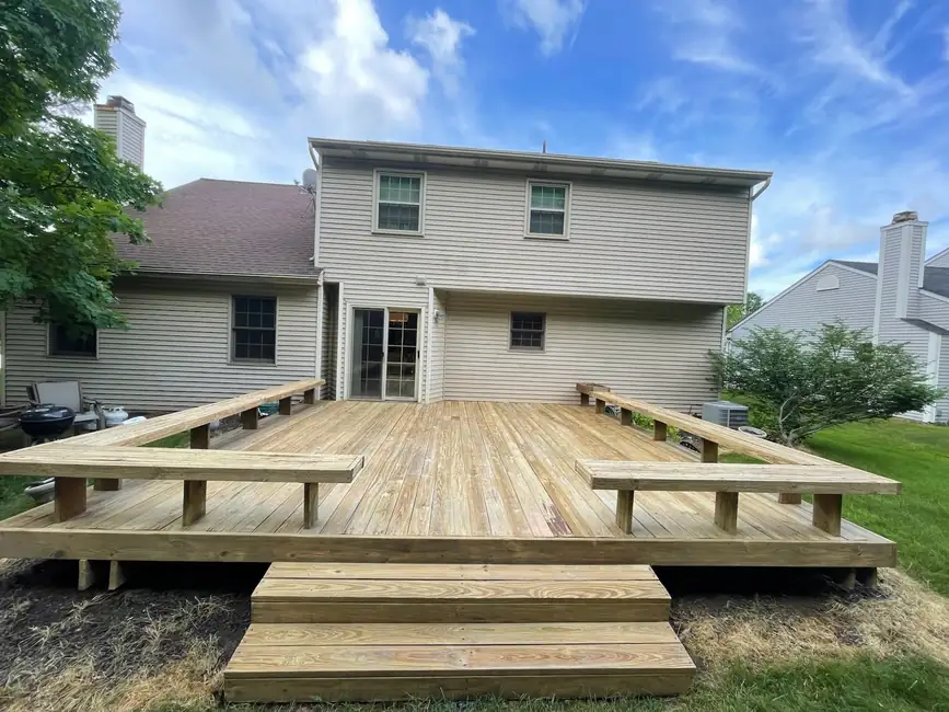 Pressure treated deck with built in benches ready for stain