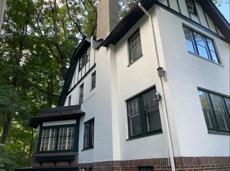 Stucco house painters near me in Olmsted Falls, OH by Chagrin Falls Painting Company, exterior coating work for strong coverage and weather resistance