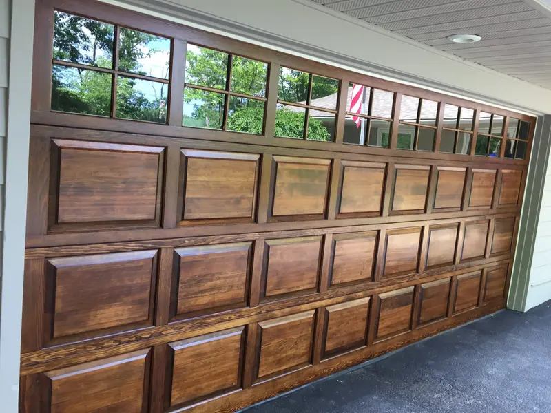 Stained wood raised panel garage door by Chagrin Falls Painting Company, Ohio